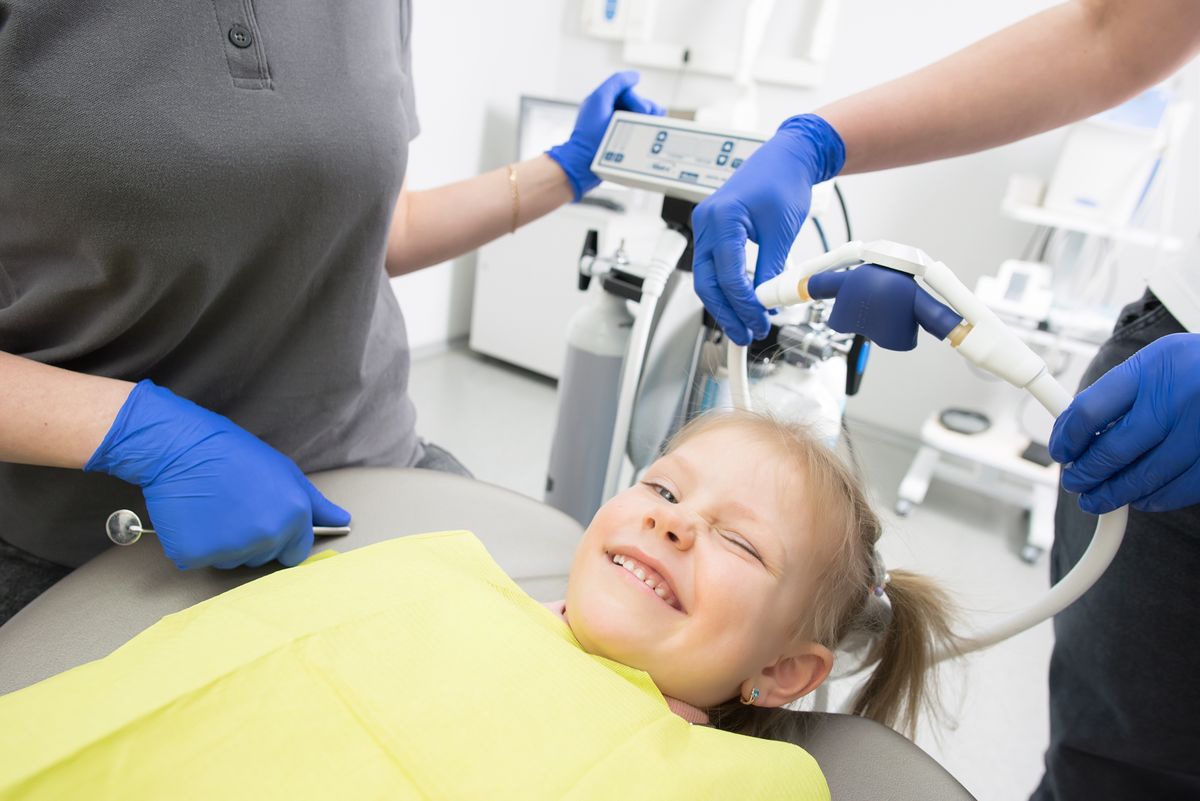 kids dentist kharghar sector 20 child smiling dental chair navi mumbai