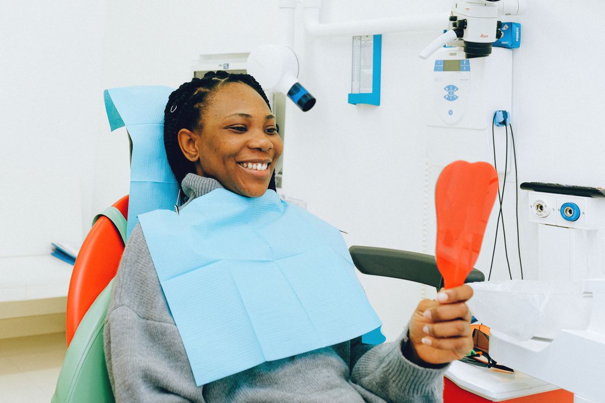 teeth whitening cost kharghar sector 20 dental clinic patient smiling