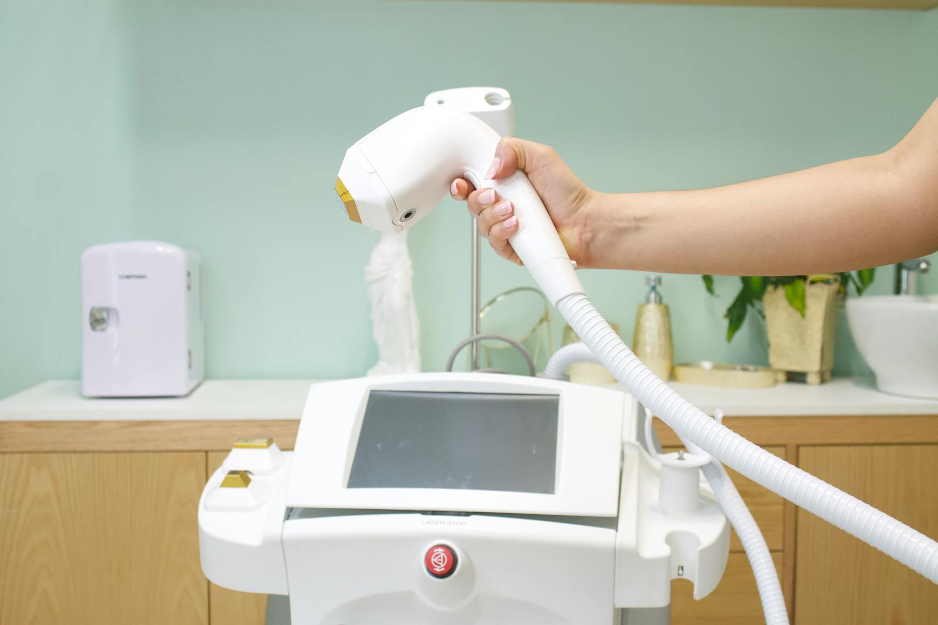 Laser hair reduction Kharghar Navi Mumbai — clinical laser device at Dental and Aesthetic by Dr. Mavleen